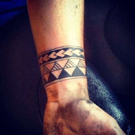 tattoos for men on wrist|tribal wrist tattoos for men.